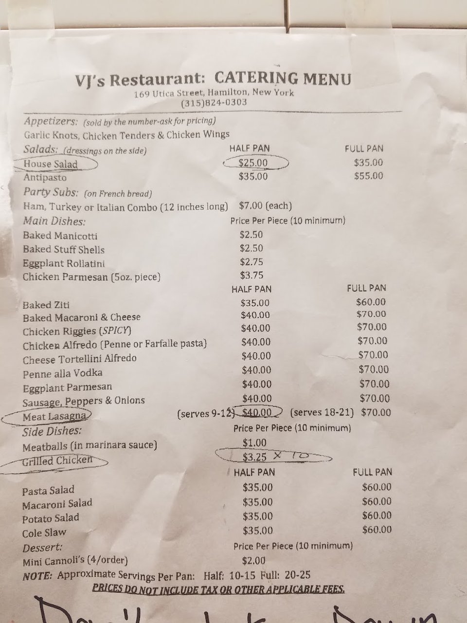 Printed menu with pizza and subs